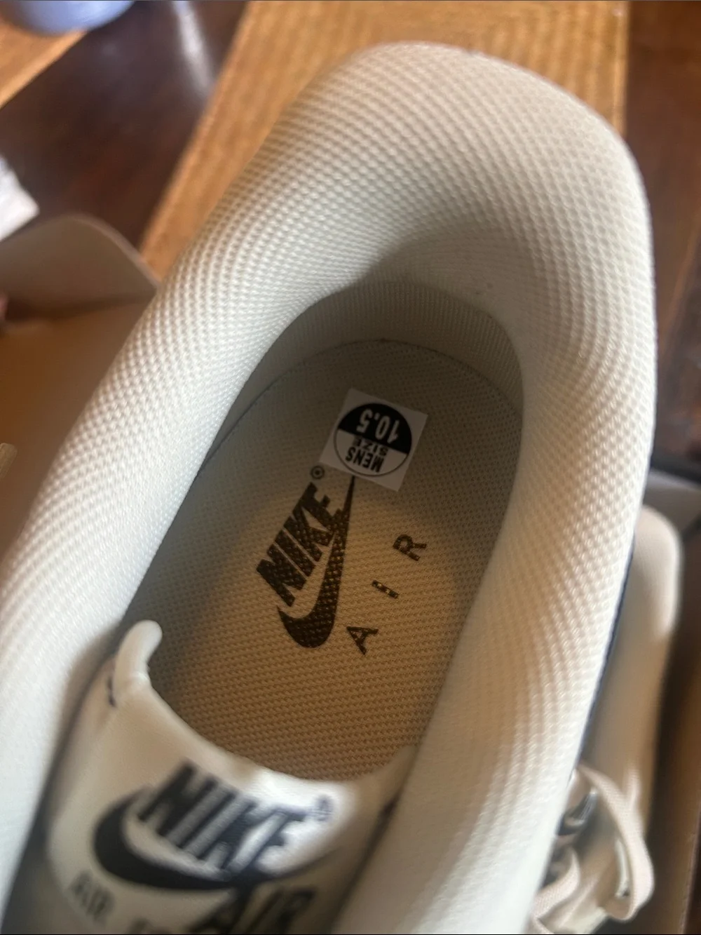 Nike Air One Men’s Low-Top Sneakers in Cream with Black Swoosh